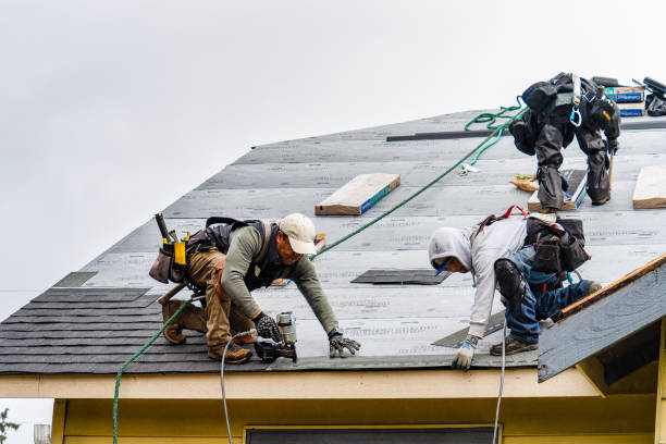 Professional Gutter Installation technician working in Sagaponack, NY